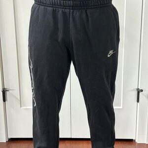 Nike Black Sweatpants with Tapered Cuffs and Drawstring Waist
